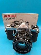 Pentax Asahi ME SLR Film Camera W/ Case, Flash, 50mm And 28mm Lens And Case
