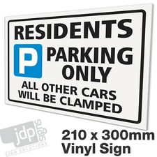 RESIDENTS PARKING ONLY – ALL OTHER CARS WILL BE CLAMPED - EXTERNAL RIGID SIGN