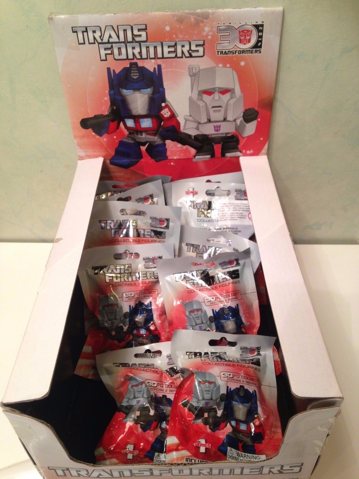 Lot 10 sachets et boite Transformers 30 thrilling 2014 Serie 1 Lot 10 sachets et boite Transformers 30 thrilling 2014 Serie 1