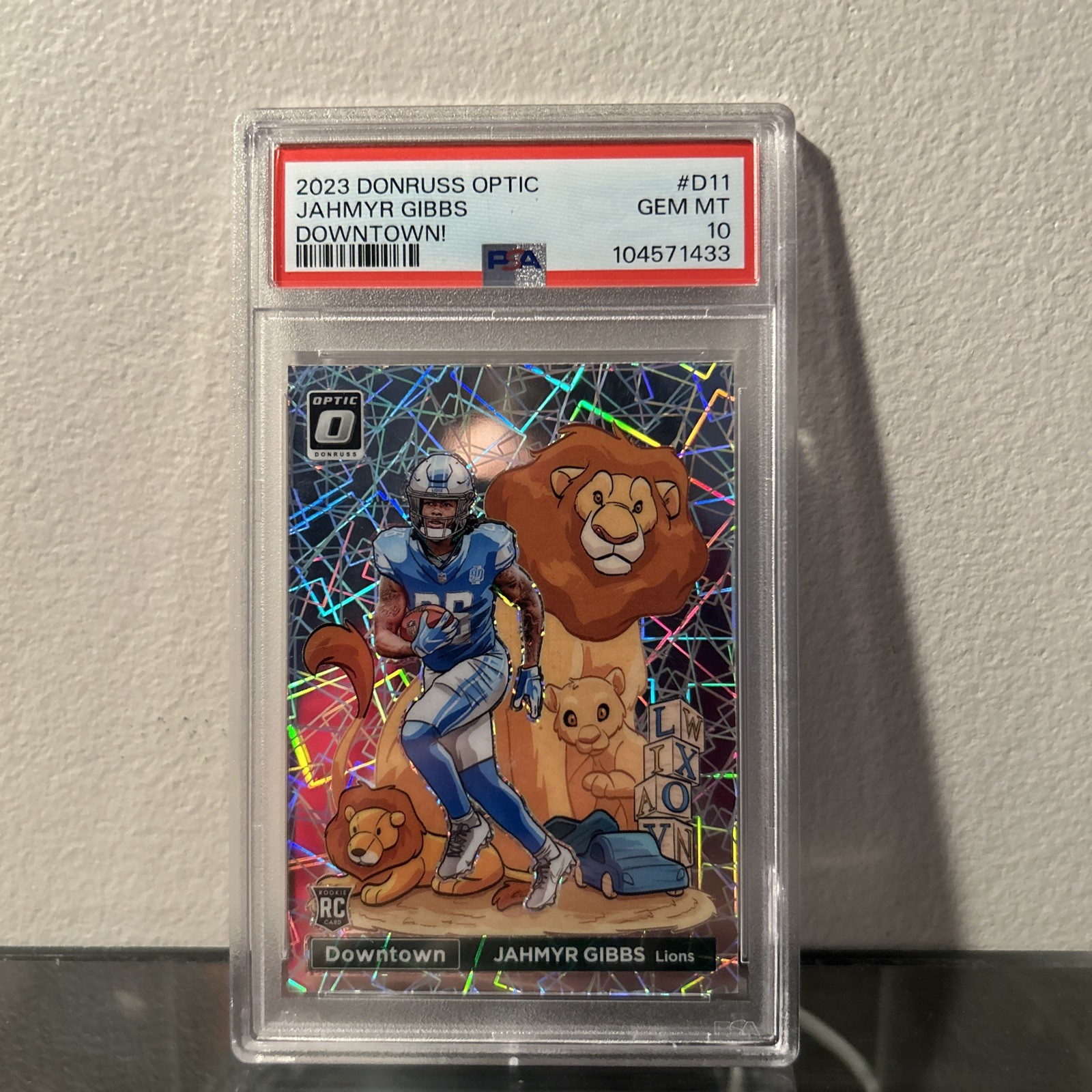 2023 Panini Donruss Optic Jahmyr Gibbs Downtown #D-11 (RC) PSA 10 - Lions
