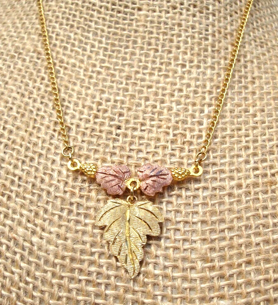 Vintage black online hills gold necklace