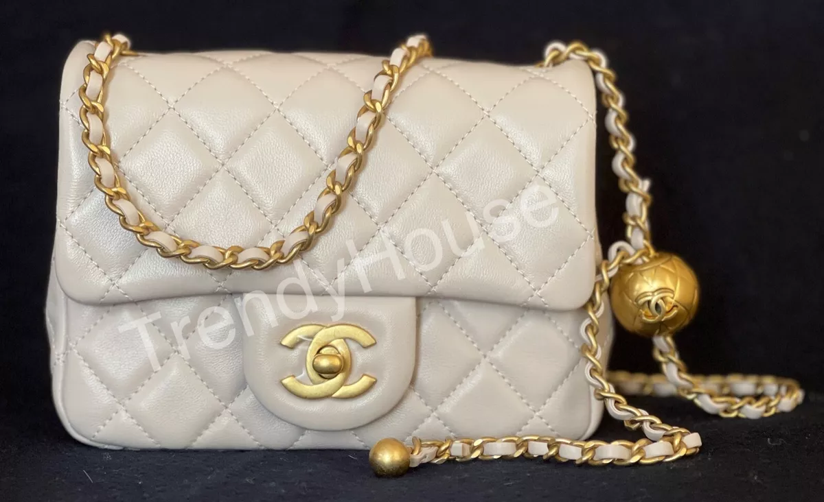 chanel mini bag with pearl strap