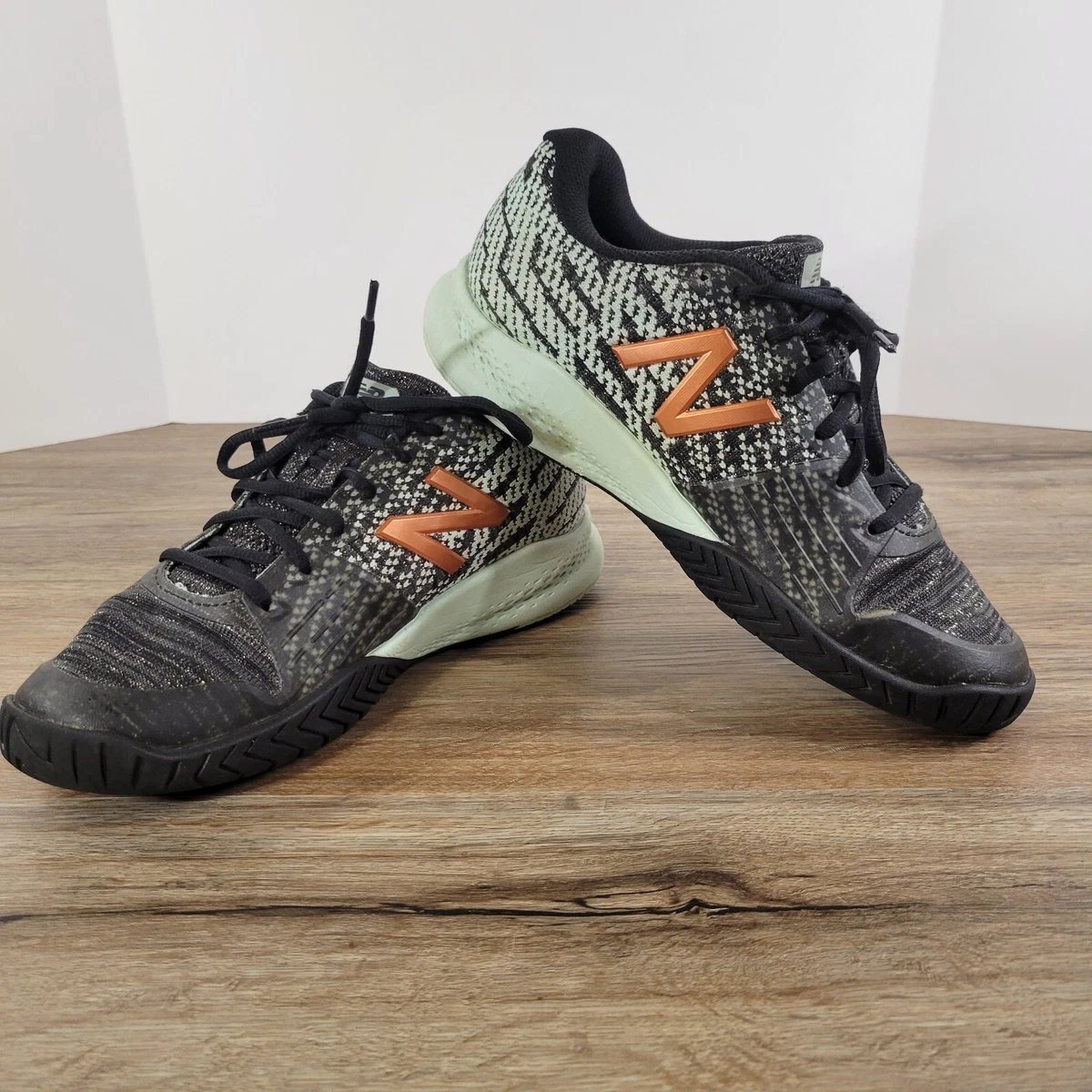 Womens black top and orange sneakers