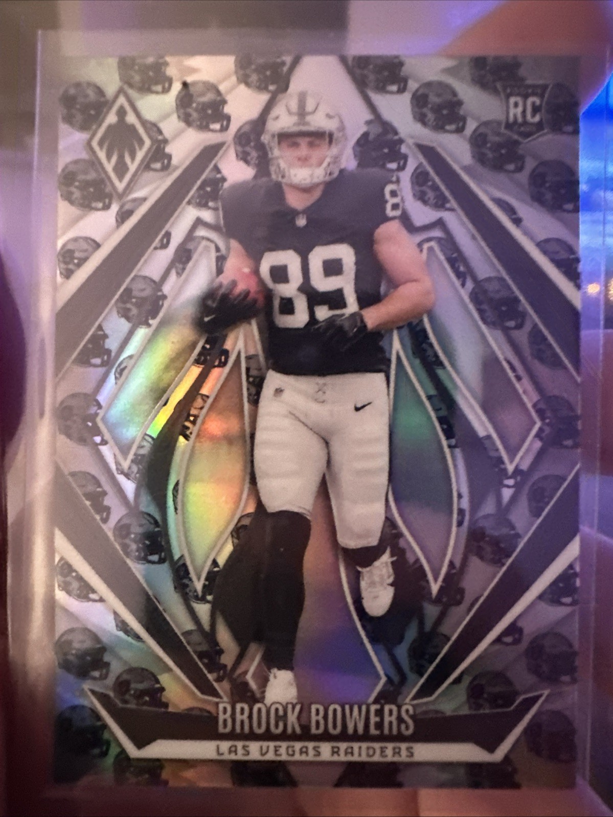 2024 Panini Phoenix - Rookies Brock Bowers #165 Team Helmet /399 (RC)