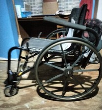 wheel chair quickie only used for about a week, still in brand new condition