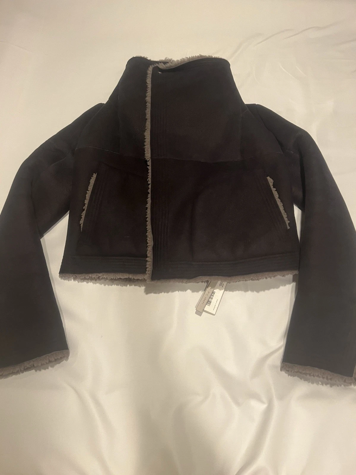Giacca in shearling Rick Owens. 44 S. 3890€
