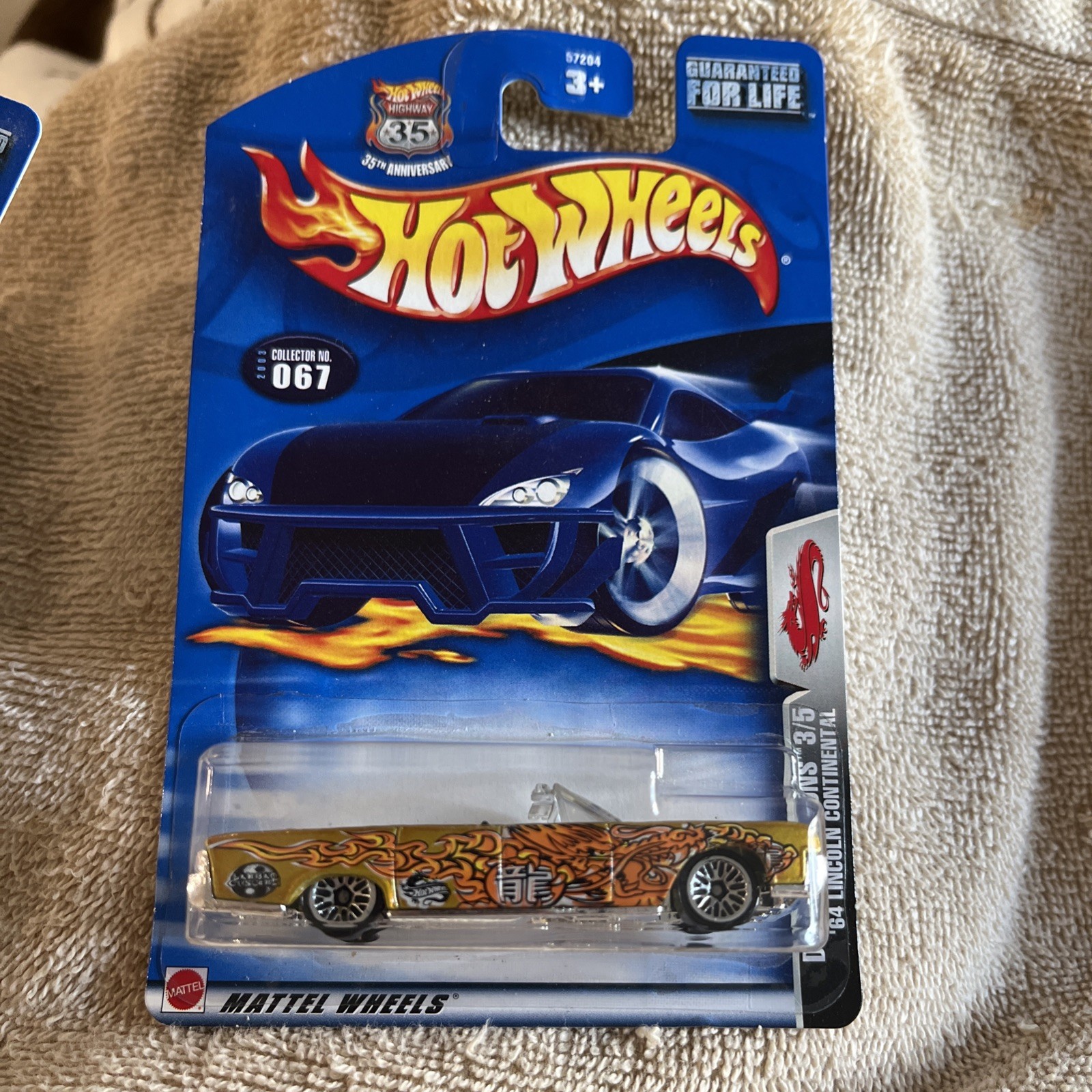 2003 Hot Wheels #67 Dragon Wagons 3/5 '64 LINCOLN CONTINENTAL Gold w/Lace Spokes