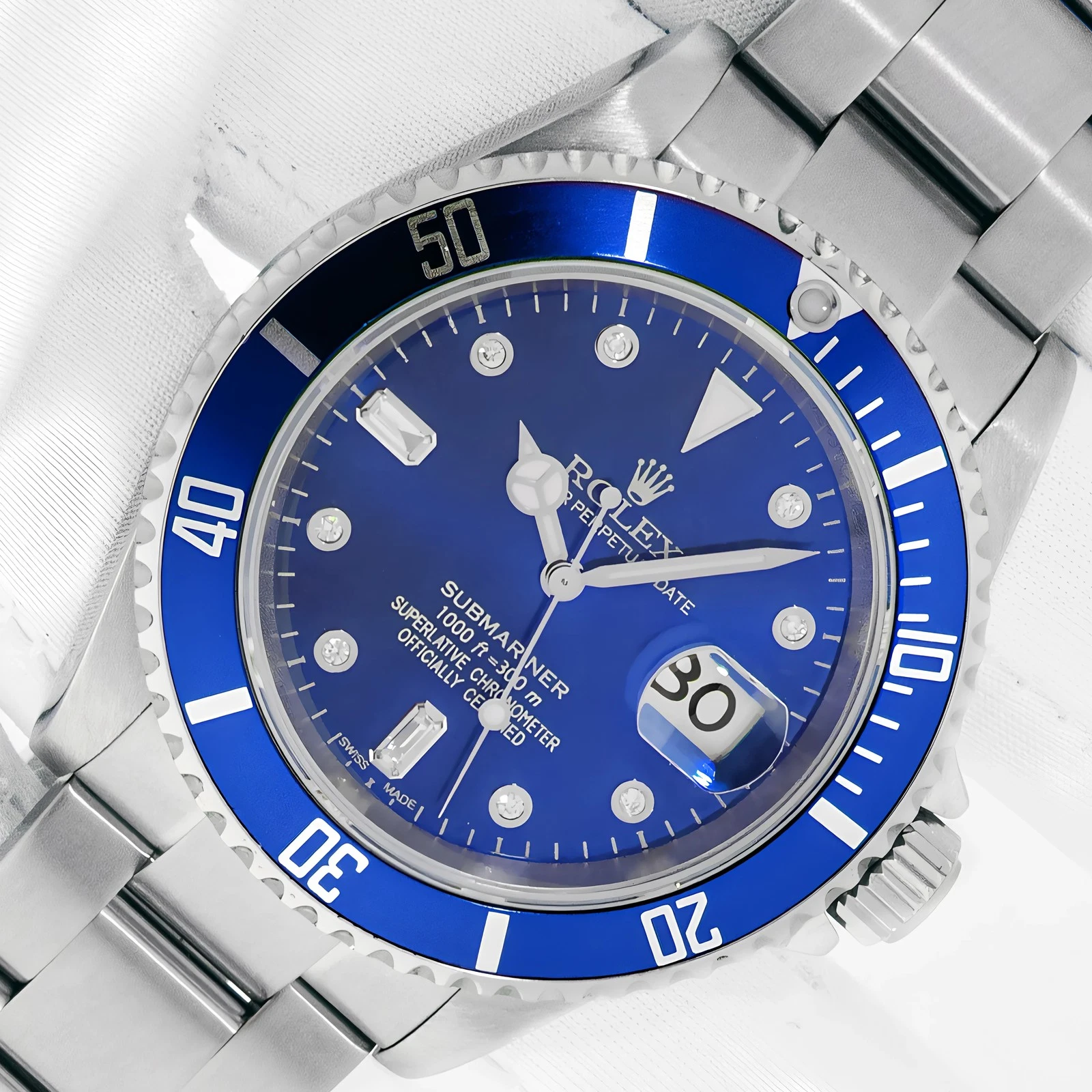 ROLEX SUBMARINER DATE STAINLESS STEEL WATCH WITH BLUE DIAMOND DIAL BLUE INSERT
