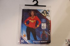 WOMAN'S WONDER WOMAN COSTUME, NEW. LARGE. FITS DRESS SIZE 14-16. SHIRT CAPE.