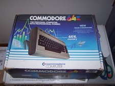 Commodore 64 in original box with AC adapter and User's Manual SOLD AS IS