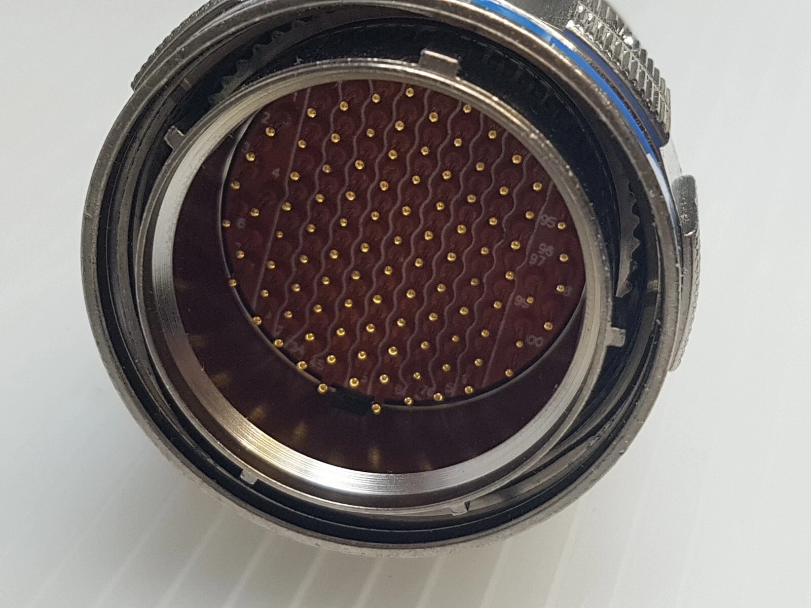 Pin face of the circular multi-pin connector on the monitor cable