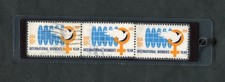 1975 INTER. WOMEN YR. LAMINATED BOOKMARK W/REAL U.S. POSTAGE STAMPS. NEW! #1571