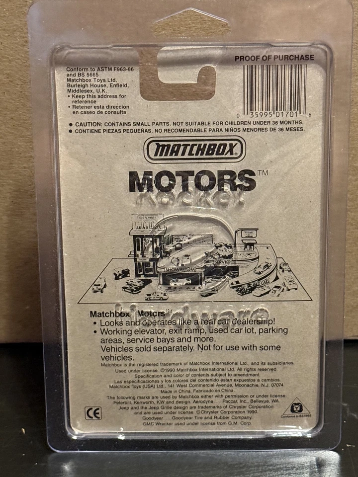 1990 Matchbox MB1 Yellow "Toyman" Dodge Challenger on Card with Protector - Image 2 of 2