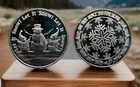 .999 silver 1 oz ounce round bullion. frosty the snowman