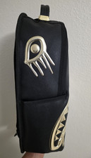 Sprayground Black/Gold Shark Mouth backpack