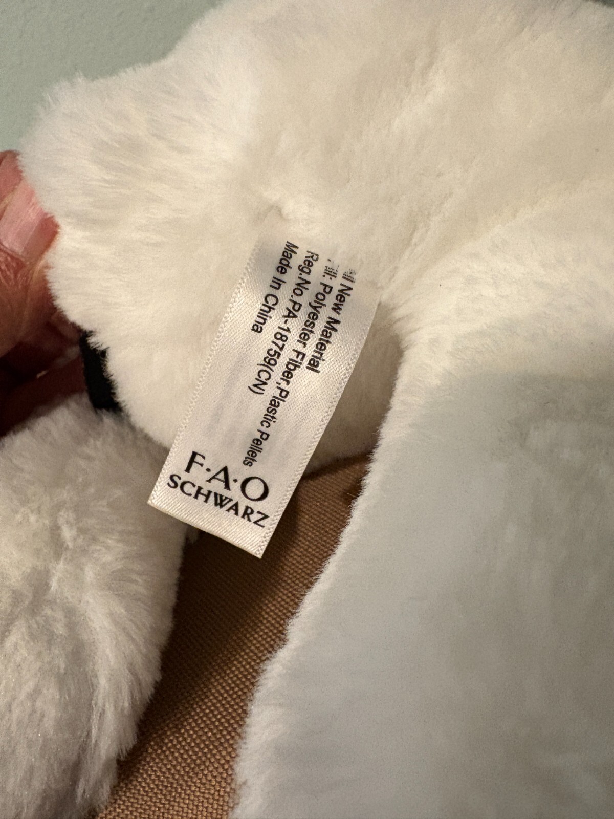 F.A.O. Schwarz Black & White Plush Dog 13 in Long