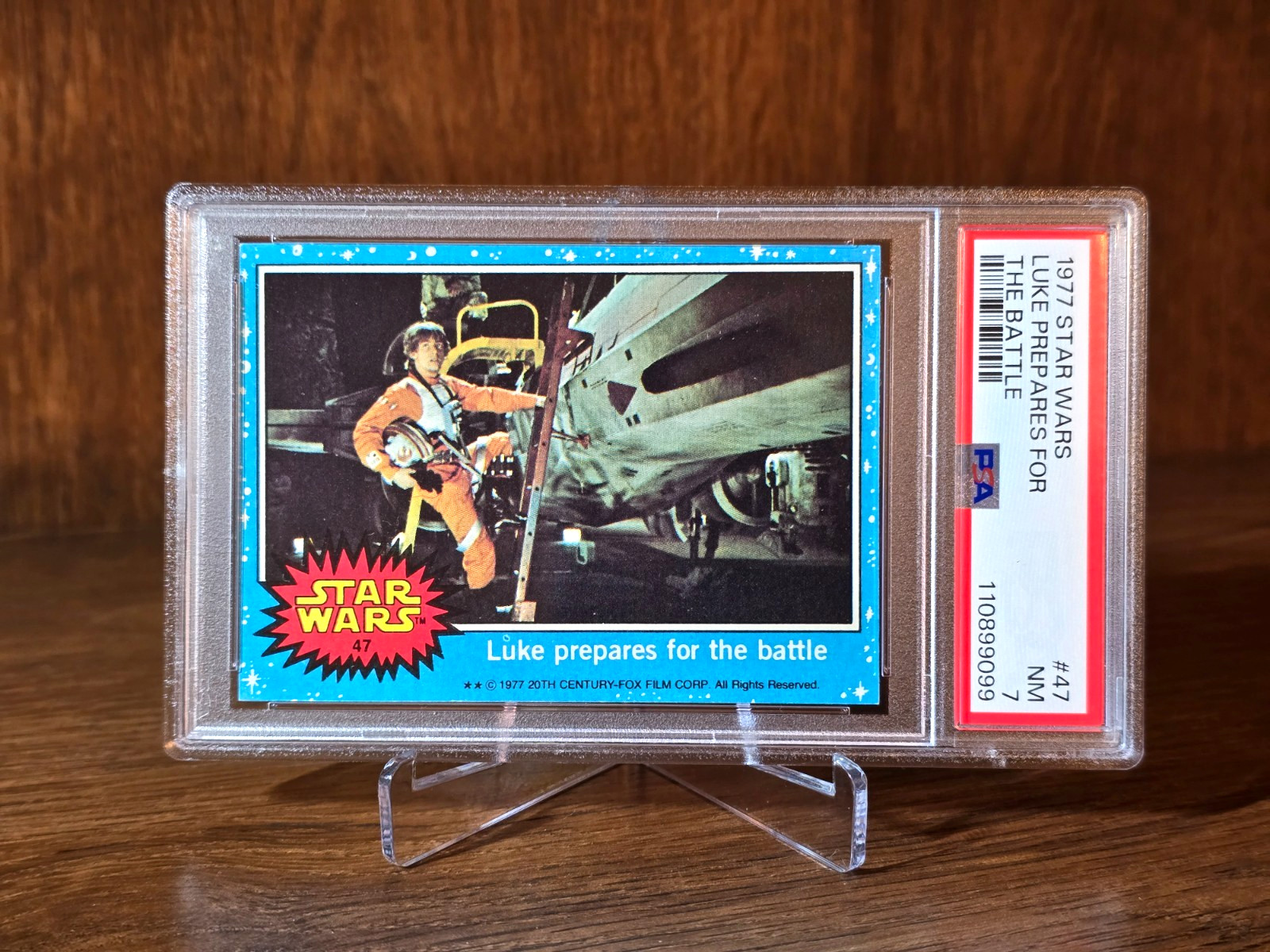 1977 Topps Star Wars #47 Luke Prepares for the Battle Series 1 Blue PSA 7 NM