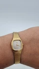 Vintage Seiko Quartz Gold Tone Ladies Watch Rectangular Case Integrated Bracelet
