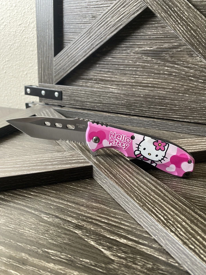 NAVAJA DE BOLSILLO PLEGABLE ASISTIDA POR RESORTE Hello Kitty ROSA Hello Kitty 8" Blade Assist Open Foto 2 de 3