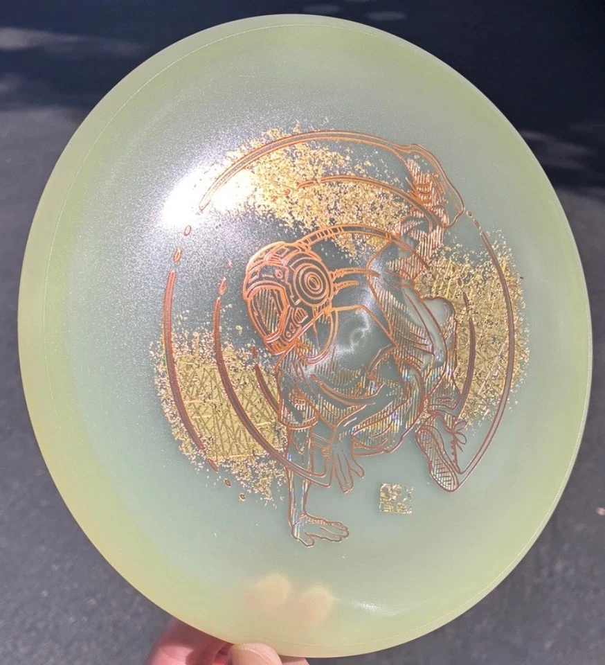Disco de golf MVP Axiom Total Eclipse Glow Proxy - Golden Goose DFX LTD “BrokeDance” Foto 4 de 4