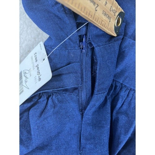 Nuevo con etiquetas Top Free People para mujer talla 2 azul Benji cuello en V peplum lazo cintura - Imagen 2 de 11
