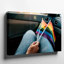 Close-up View Of A Person's Lap, Showcasing A Vibrant Rainbow Flag Wall Art
