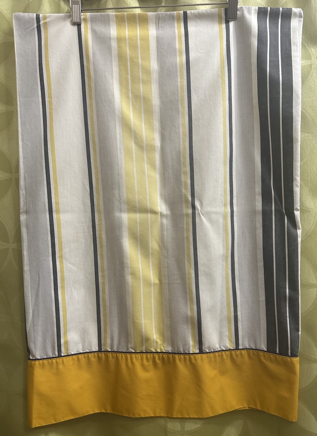 Gray gold striped WAMSUTTA ULTRACALE pillowcase with yellow border, made in USA.