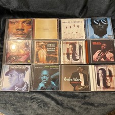 12 Cd Lot 3. Norman Brown, Eubanks, derulo, Lou Bega, Coltrane, Andre Ward, +