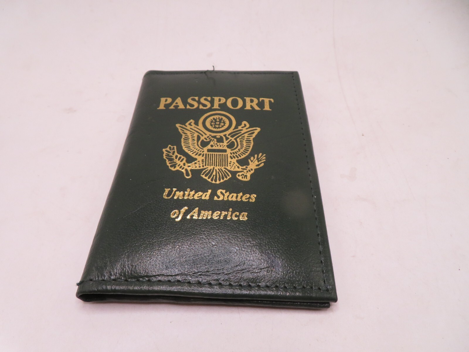 Green Leather Passport Holder That Resembles a Real Passport-image