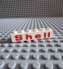 LEGO Shell klocek 1x6 biały nadruk 3009px35 3009 A205