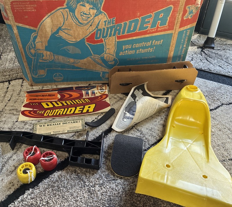 Vintage Kenner The Outrider Stunt Board Hand Steered Ride On Toy.  New In Box