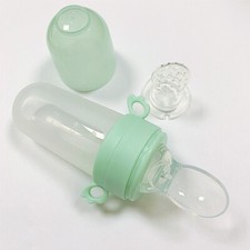 Baby Rice Cereal Bottle Silicone Squeeze Feeding Rice Cereal Spoon With Net Pock