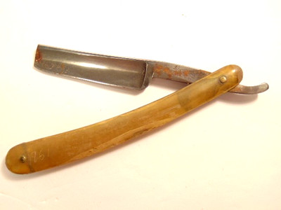 vintage straight razor marked ''Speed'' and Hamburg Hollow Ground''