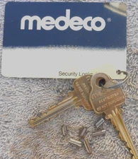 Medeco  High Security  pair  Factory precut  keys, tag,6 pins Ready to rekey
