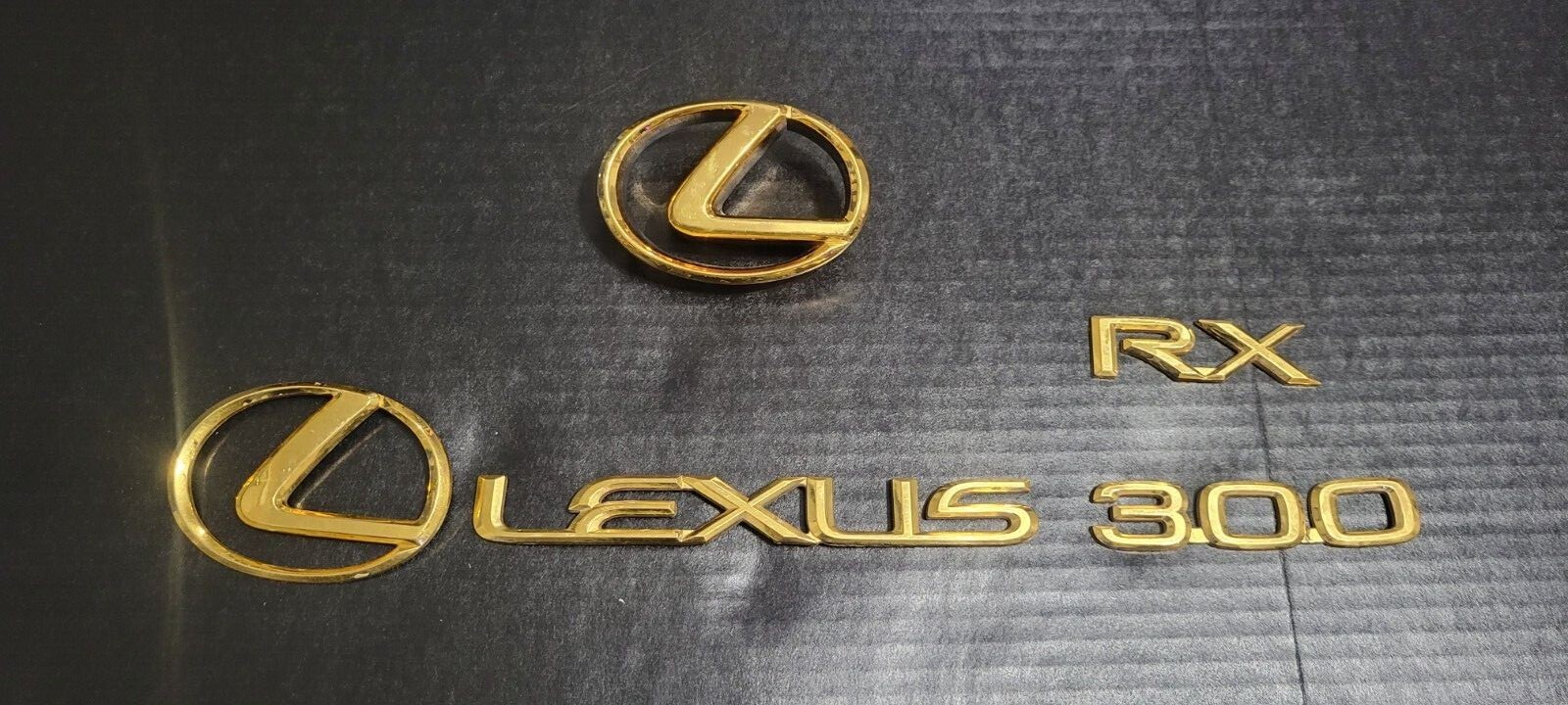 9902Lexus RX300 GOLD plated front REAR plastic Genuine Lexus 1 set of