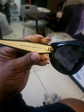 Prada PR14WS 09Q5S0 Cat Eye Sunglasses in Black and White /Gray Lens 100 UV