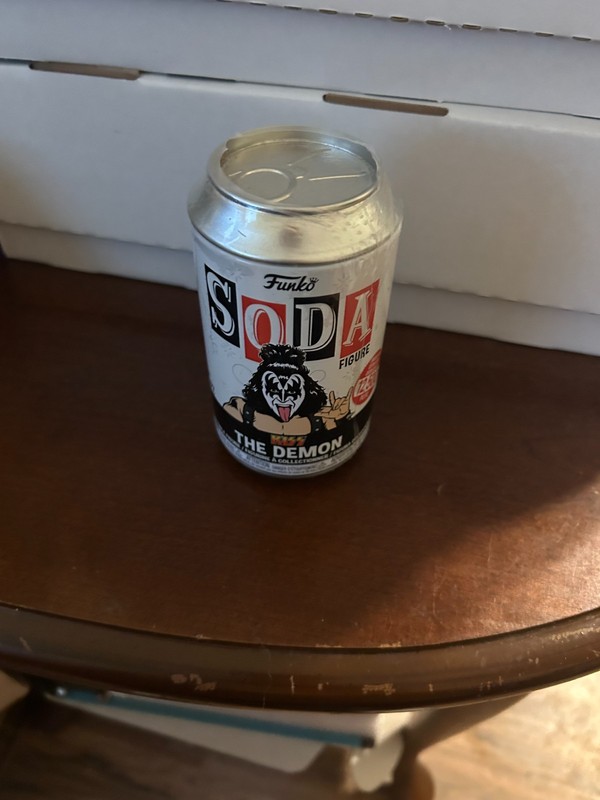 Gene Simmons funko pop in a can; new and in excellent condition