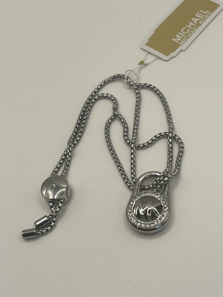 Pulsera Deslizante MICHAEL KORS NUEVA CON ETIQUETAS Tono Plata Cristal Pavé CANDADOS Foto 4 de 4