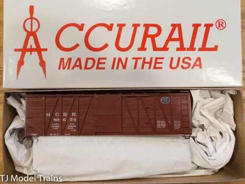 Vagón de carga Accurail HO #4120 (Rd #80674) MCRR/NYC extremos de madera exterior reforzado 40' | Zustand: New