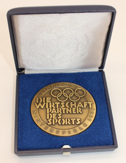 ROH1792: Medaille Olympische Winterspiele 1976 Wirtschaft Partner d. Sports