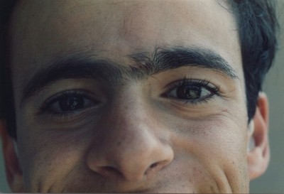 1980s Close-up Handsome Man Smiling Face Eyes Hairy Eyebrows Portrait