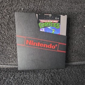 Cartuccia gioco Teenage Mutant Ninja Turtles NES e manicotto antipolvere (TESTATO FUNZIONANTE)