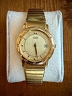 Vintage Citizen Quartz Gold Tone Roman Numeral Bezel Date Watch 5510-K06860
