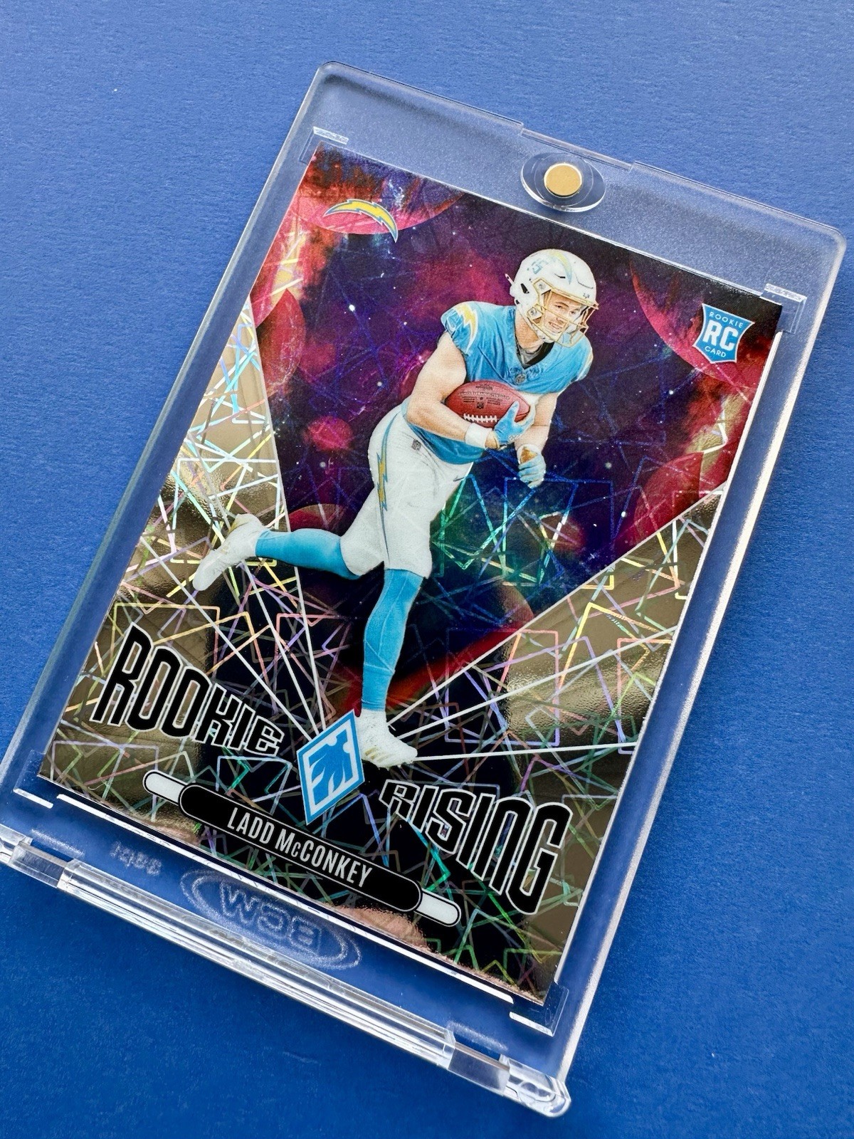 2024 Panini Phoenix - Rookie Rising Ladd McConkey  (RC) Chargers Laser Prism