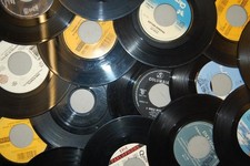 Jukebox record hole cutter  --cuts clean accurate holes easily.