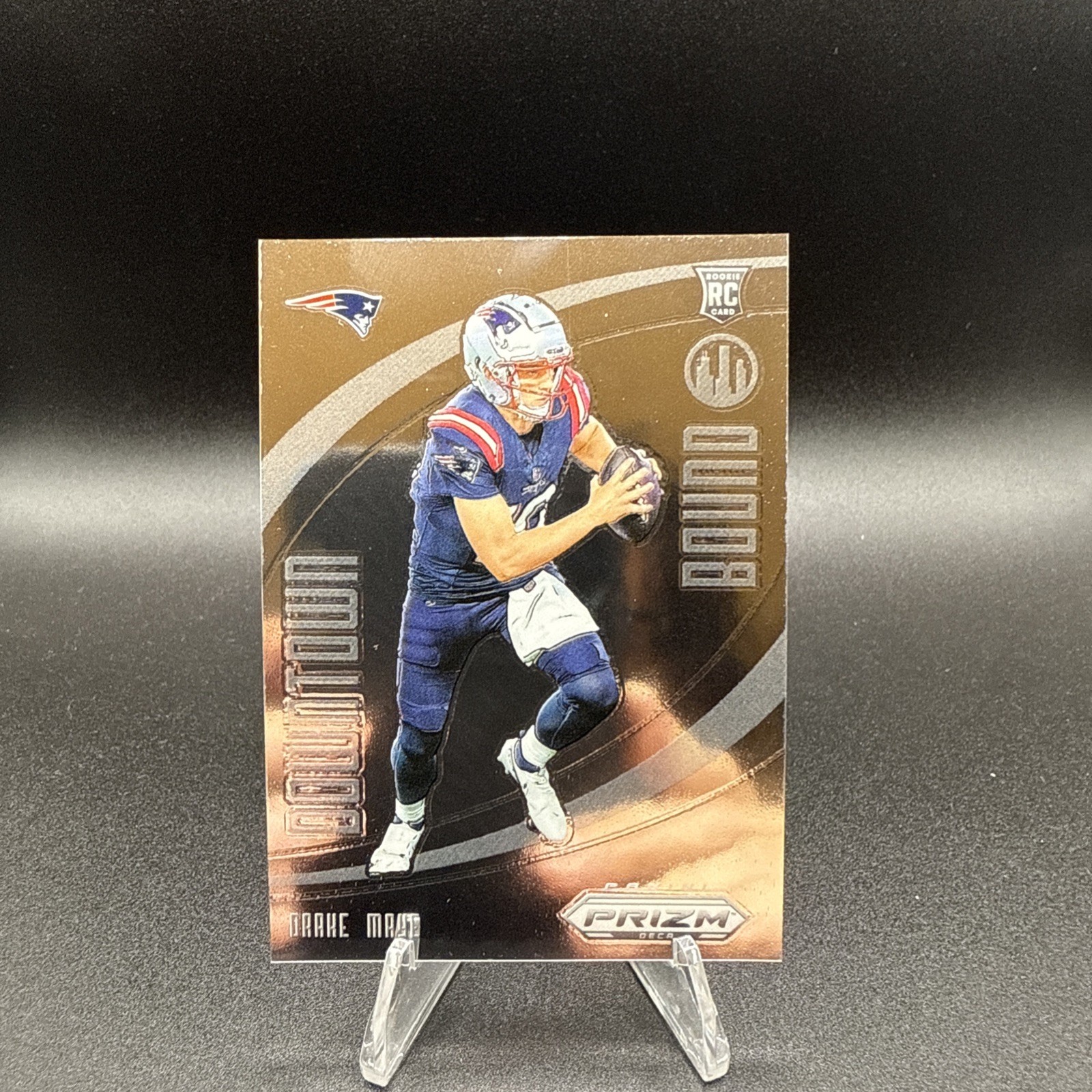 2024 Panini Deca Prizm Football DRAKE MAYE Patriots Downtown Bound Rookie Insert