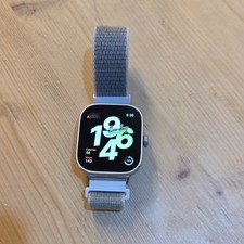 Redmi Watch 4 argento, cinturino nylon grigio Android