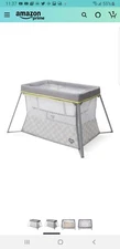 Delta Children Viaggi Plus Playard with Bassinet Insert in Mosaic Washable