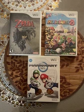Mario Kart Wii (Nintendo, 2008) Mario Wii Party 8 2007 Zelda The Legend Wii 2006