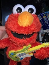 Playskool Sesame Street Rock and Rhyme Elmo Talking 14" Plush Toy